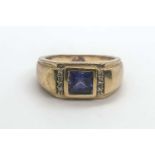 A 9ct yellow gold and tanzanite ring, the tapered ring mount inset with a square-cut tanzanite and