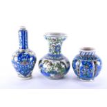Three Persian Qajar pottery vases, 19th century, one with a depiction of a prince and princess