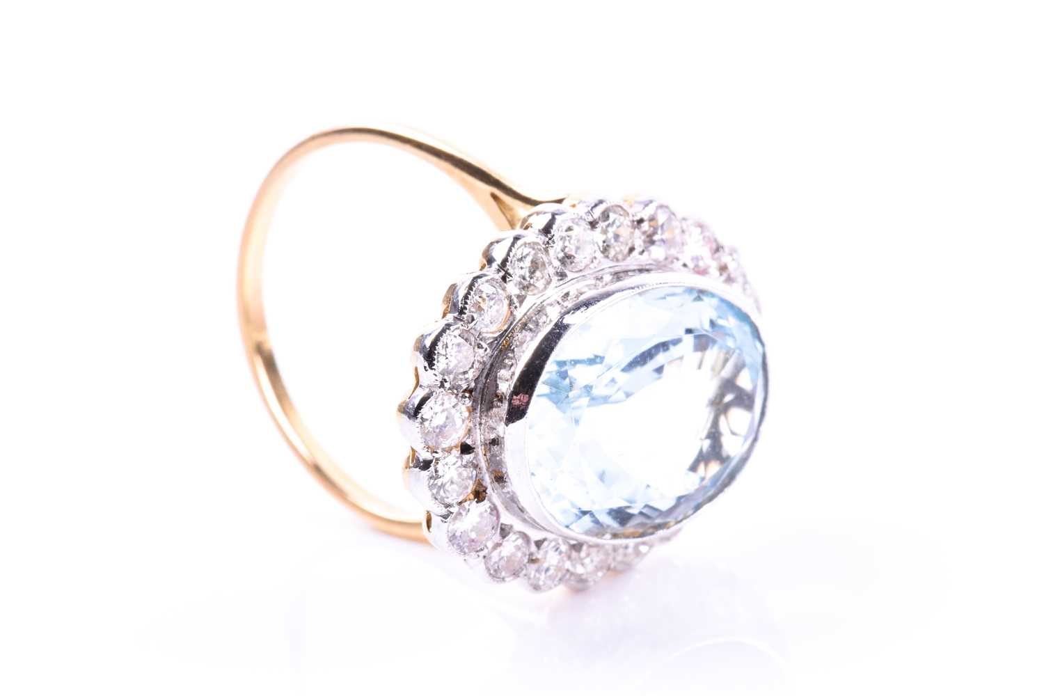 An 18ct yellow gold, diamond, and aquamarine cocktail ring, set with a mixed oval-cut aquamarine - Image 4 of 4