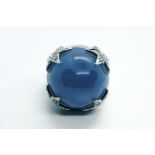 Margherita Burgener. An 18ct white gold, diamond and chalcedony ringset with a round cabochon blue