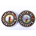 A pair of Swiss Thoune large earthenware chargers / wall plaques, the central panels depicting
