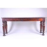 A Victorian mahogany side table, the rectangular top with rounded corners and leather writing
