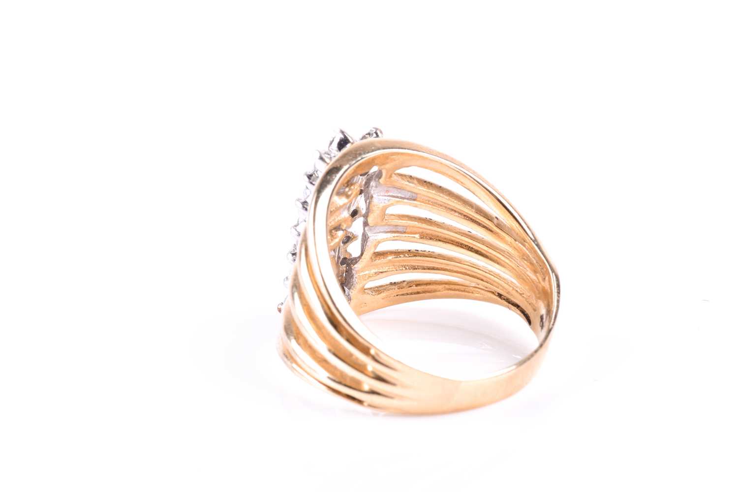 A yellow metal and diamond dress ring, the five-bar split shank centred with a triple row of round - Image 3 of 3