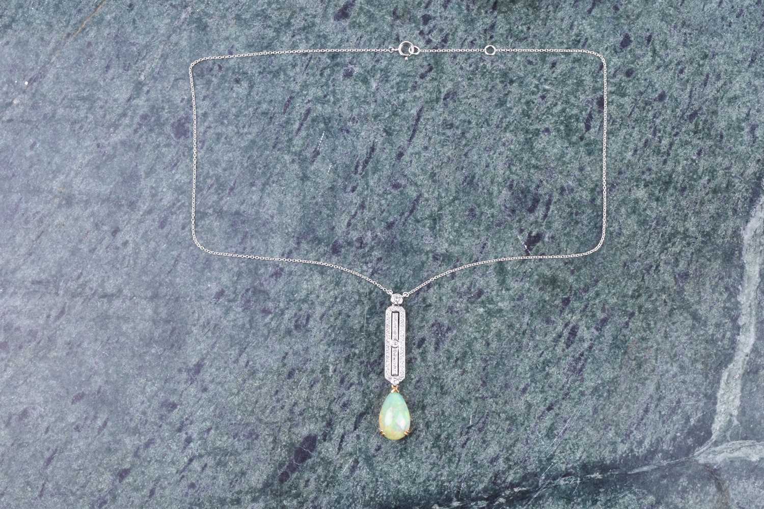 A diamond and opal drop pendant necklace in the Art Deco style, set with a pear-shaped cabochon opal - Image 3 of 4