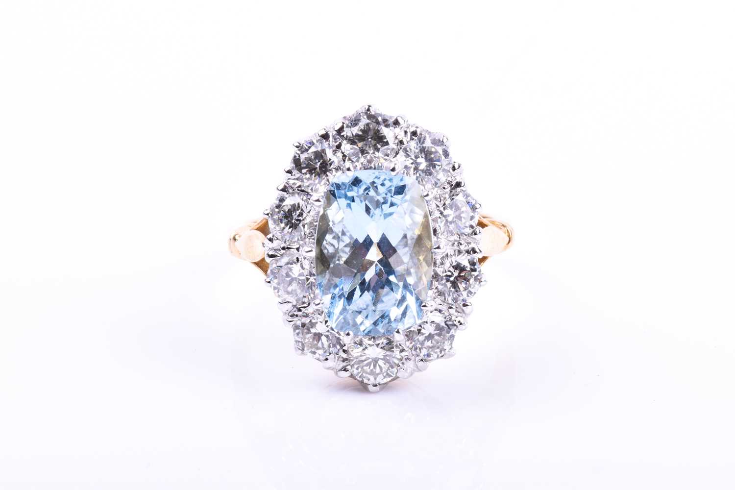 An 18ct yellow gold, diamond, and aquamarine ring, set with a mixed rectangular cushion-cut