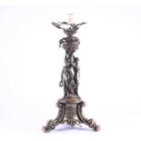 An Victorian silver plated figural lamp of imposing proportions, with grape and vine decoration over