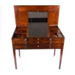 Georgian mahogany gentleman's dressing table, the hinged top opening to reveal an adjustable ratchet