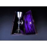 A Victorian portable silver Communion set, the chalice Walter & John Barnard, London 1877, the paten