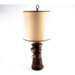An early 20th century wooden lamp, modelled as a post box with brass mounts, 77 cm high, to
