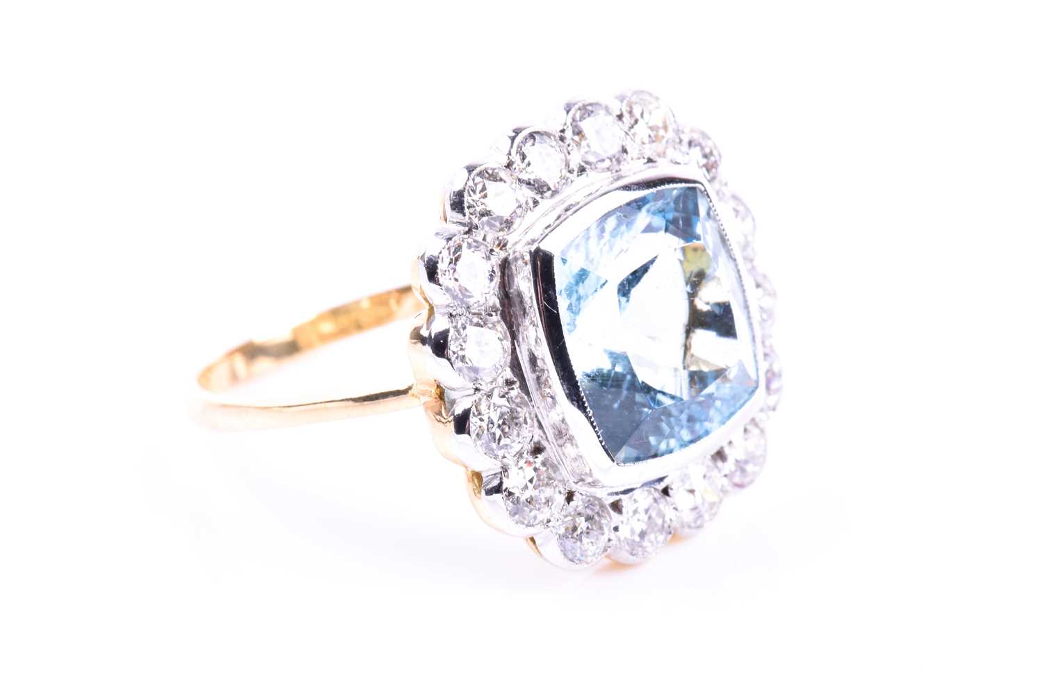 An 18ct yellow gold, diamond, and aquamarine ring, set with a mixed cushion-cut aquamarine of - Image 2 of 5