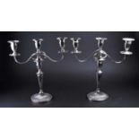 A pair of large George III style silver plate on copper three branch candelabra, 20th century,
