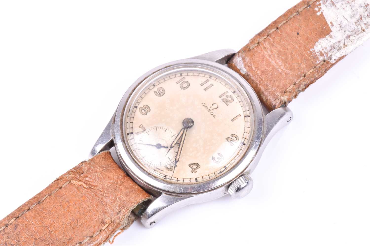 A 1950s Omega stainless steel wristwatch, the silvered dial with luminous numerals and hands, with