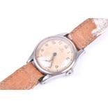 A 1950s Omega stainless steel wristwatch, the silvered dial with luminous numerals and hands, with