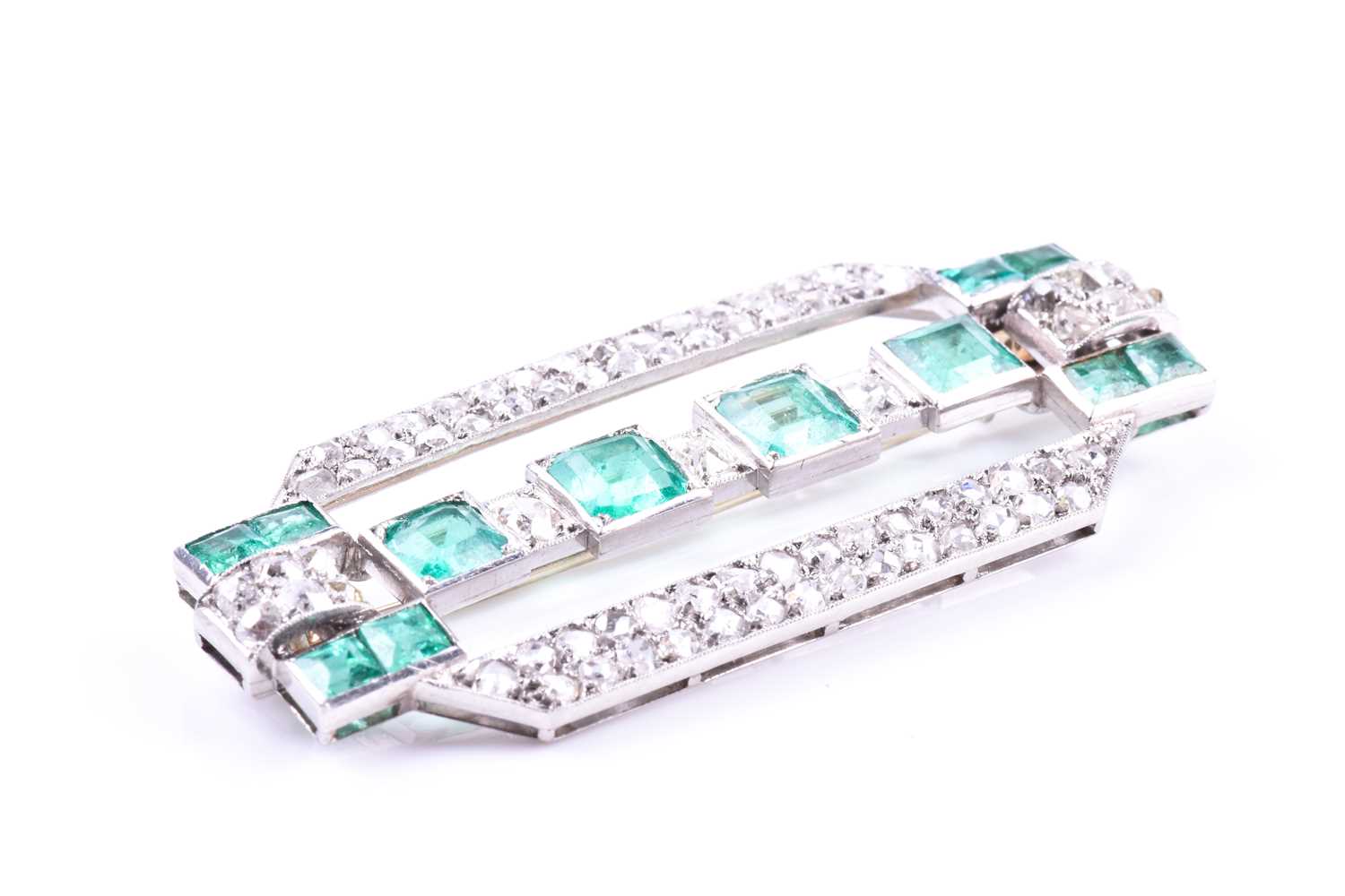 An Art Deco diamond and emerald broochthe rectangular mount inset with twelve emeralds (likely of - Image 4 of 5