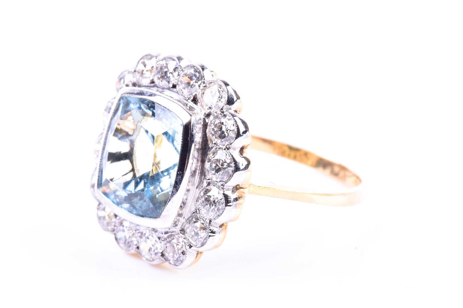 An 18ct yellow gold, diamond, and aquamarine ring, set with a mixed cushion-cut aquamarine of - Image 5 of 5