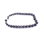 A banded agate necklace, formed of 32 graduated beads, one concealing fitted base metal clasp, the