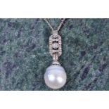 A diamond and pearl pendant, the rectangular plaque mount inset with round-cut diamonds, and