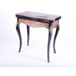 A late 19th century boulle marquetry card table, with gilt metal mounts and red tortoiseshell