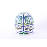 A Persian embroidered felt Dervish hat, early 20th century, embroidered in green, blue, yellow and