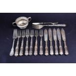 A group of silver-handled flatware, together with a Continental silver plated twin-handled cup.