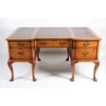 A Titchmarsh & Goodwin Queen Anne style walnut writing desk, with tooled leather writing surface