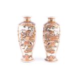 A pair of Satsuma vases, circa 1880, of square tapering form, decorated with panels of samurai,
