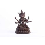 A Sino Tibetan parcel gilt bronze figure of Namgyalma Ushnishajijaya, on a double lotus leaf and