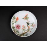 A Chinese Famille Rose saucer dish, six character Guangxu mark and probably of the period, painted