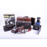 A collection of vintage cameras, to include a London Stereoscopic Co 'The Service', in leather case,