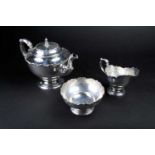 An Edwardian three-piece silver bachelor's teaset, London 1901 by Horace Woodward & Co. Ltd,