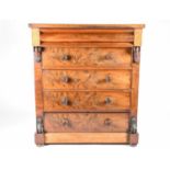A Victorian mahogany Scottish chest, with shaped frieze drawer above four well figured long drawers,