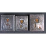 A group of three 19th century miniature white metal-mounted Russian icons, each velvet backed, the