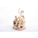 A fine19th century Meissen figure group of Bacchus with children and a goat, he seated on a wine