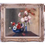 20th century school, a still life study of flowers in vases, oil on canvas, monogrammed 'EM', 62