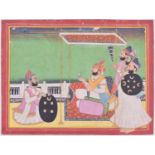 Indian School, 19th century, a maharaja holding a katar and floral sprig beneath a canopy, with