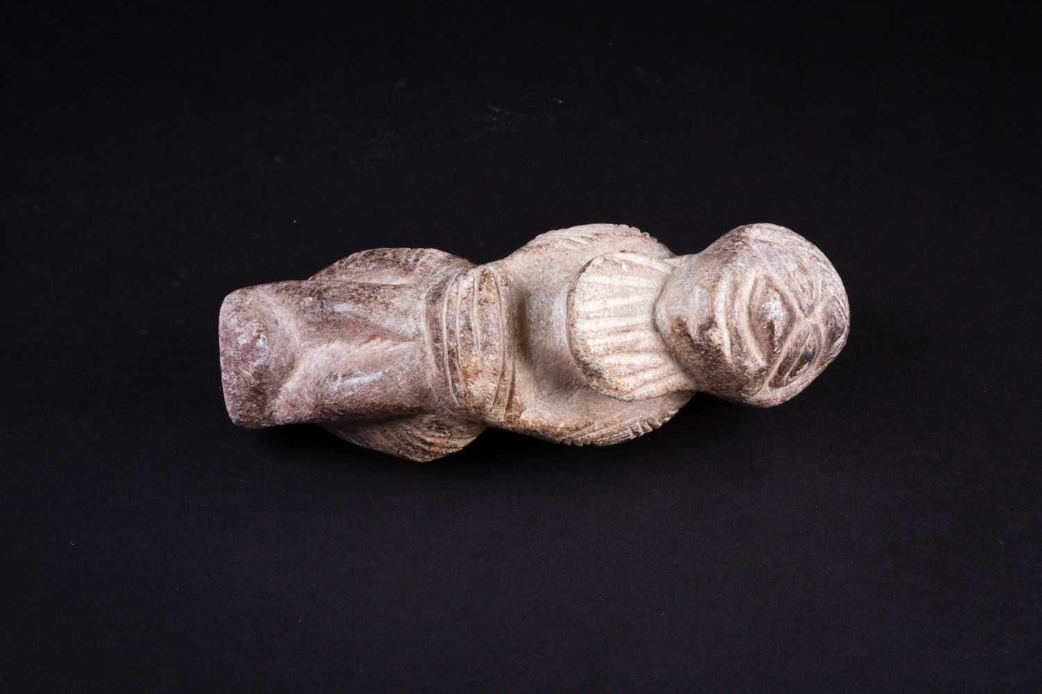 A carved stone Nomoli figure, Sierra Leone, with incised linear decoration, 17cmFootnote: From the - Image 4 of 5