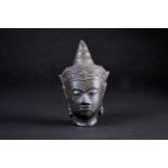 A Cambodian bronze bust of Buddha, 19th century, 15cmFootnote: From the collection of the late