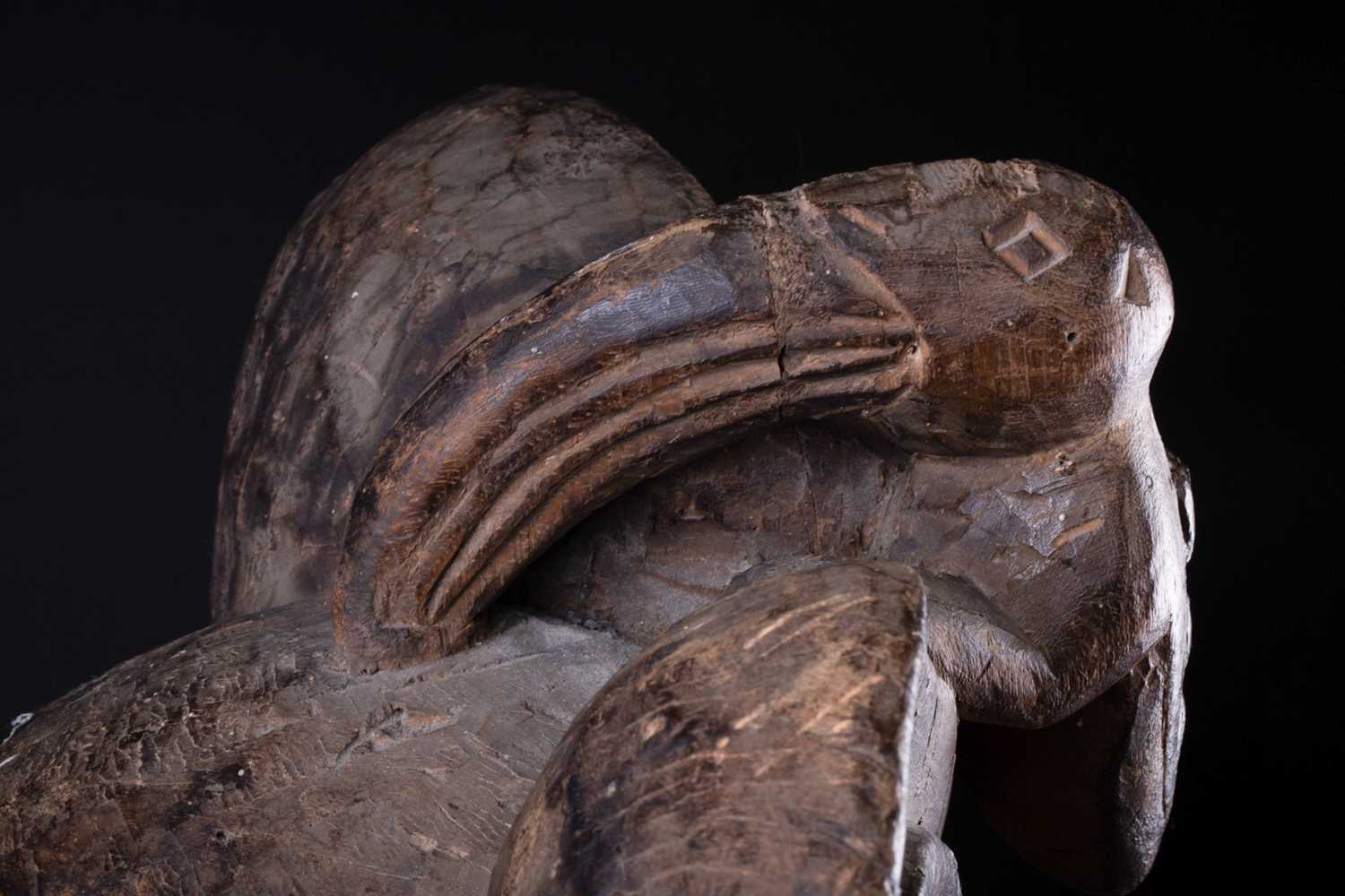 A South Seas mask, surmounted by a Toucan above large swirl type eyes, the mouth showing teeth - Image 4 of 23