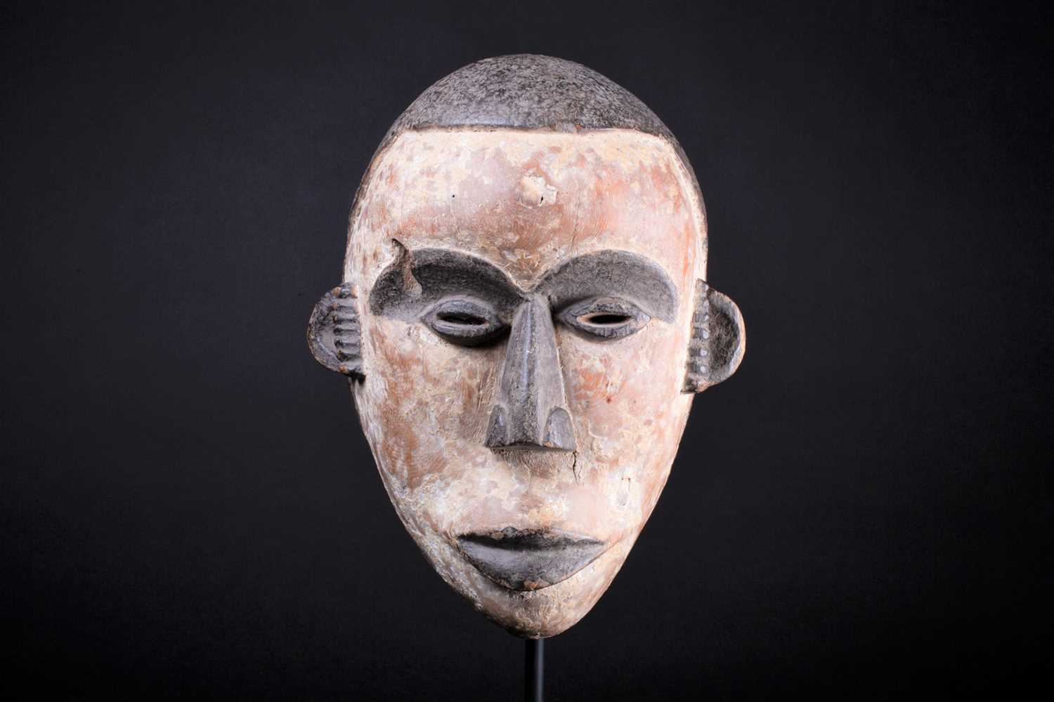 An Igbo mask, Nigeria, with short coiffure, highlighted in black against a white pigment ground, - Image 4 of 8