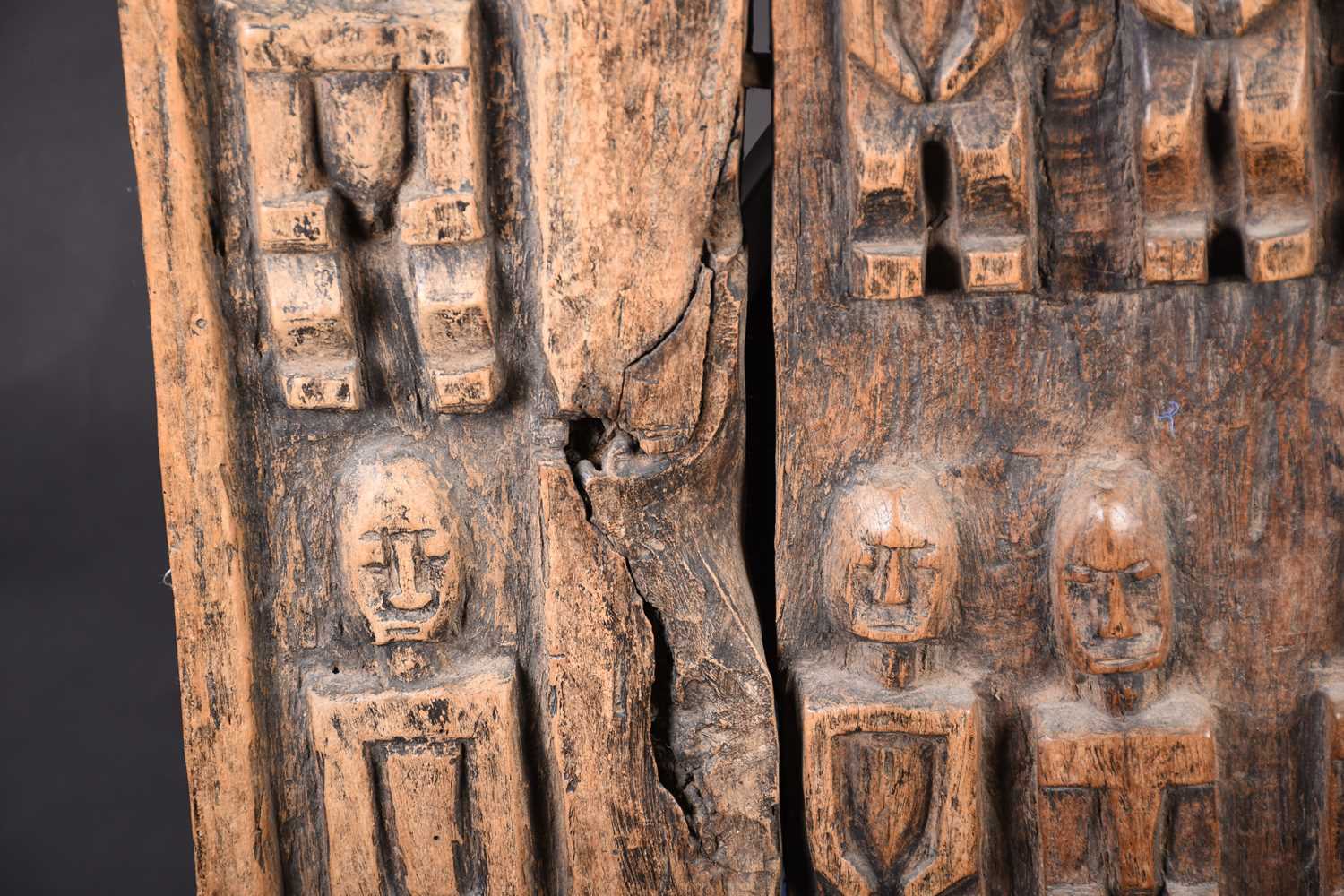 A Dogon carved wood door, Mali, carved with ancestral figures, 159cm x 56cm (excluding housing - Image 5 of 6