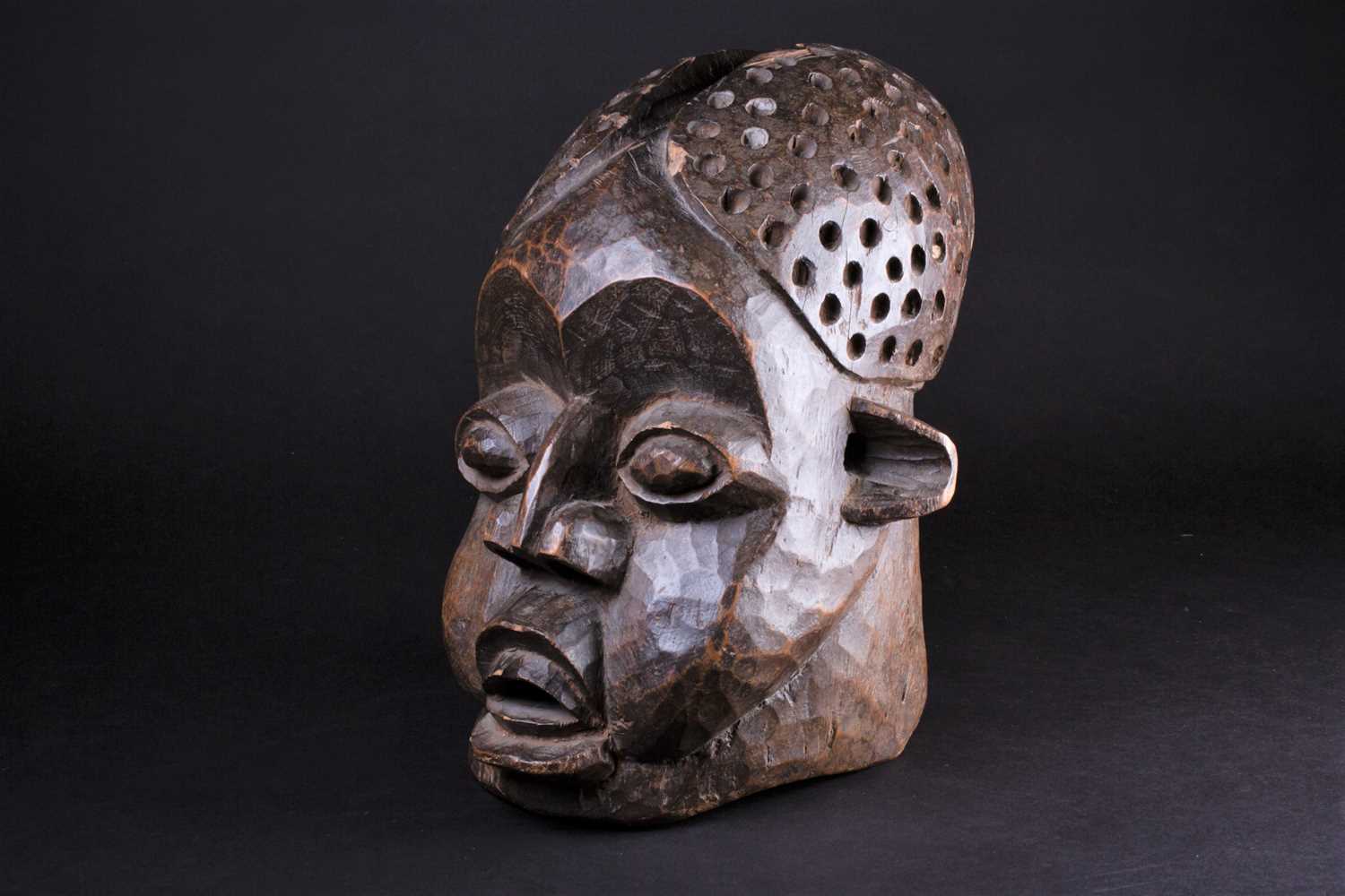 A Bamileke helmet mask, Cameroon, an elliptical opening to the crown of the elongated head, with - Image 5 of 7