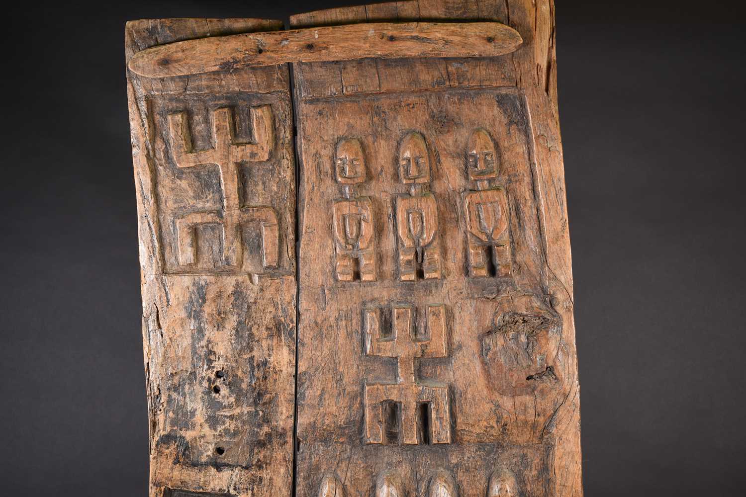 A Dogon carved wood door, Mali, carved with ancestral figures, 159cm x 56cm (excluding housing - Image 2 of 6