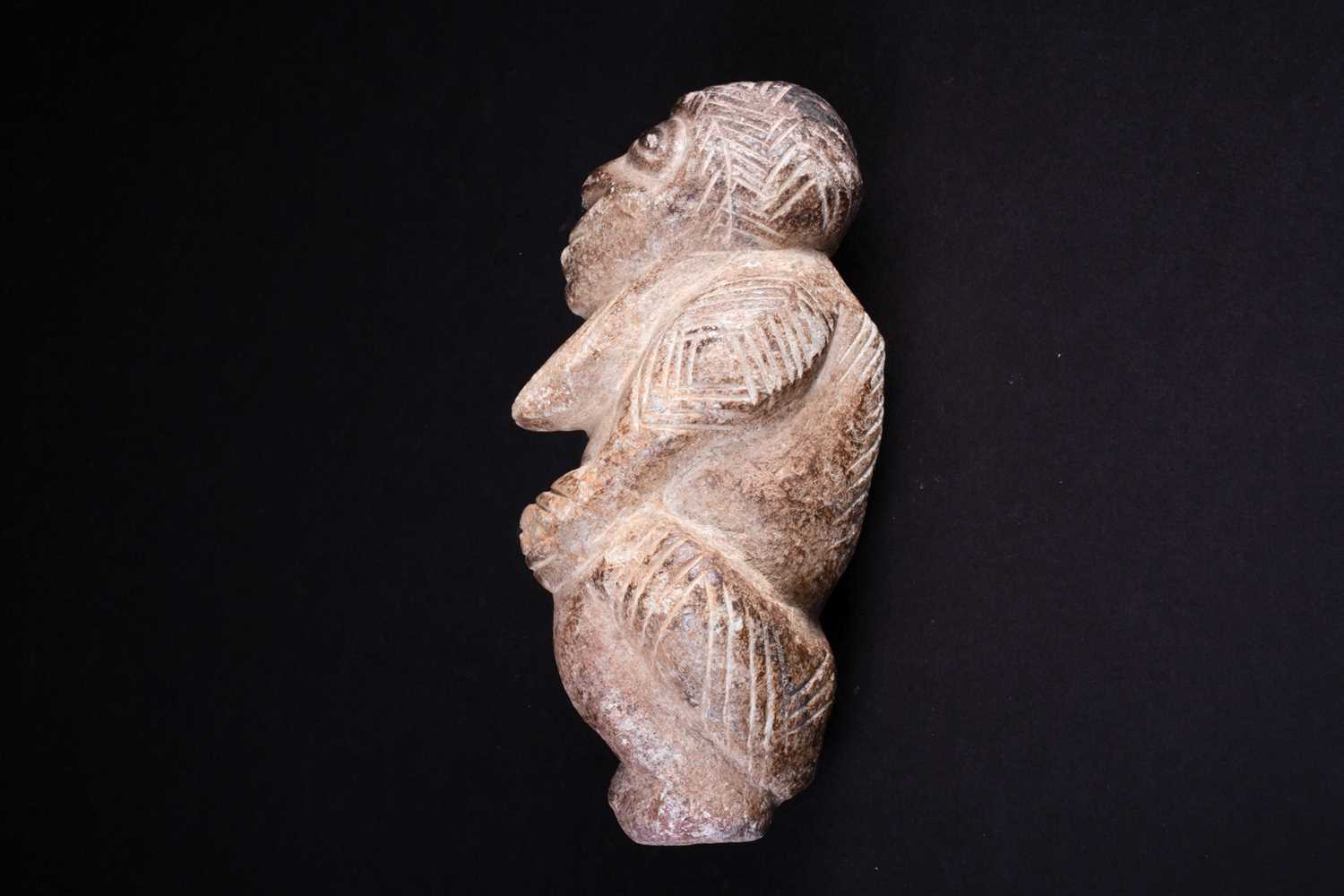 A carved stone Nomoli figure, Sierra Leone, with incised linear decoration, 17cmFootnote: From the - Image 2 of 5