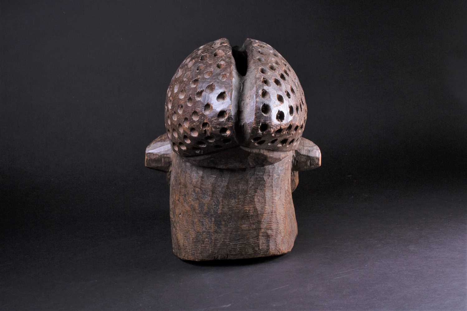 A Bamileke helmet mask, Cameroon, an elliptical opening to the crown of the elongated head, with - Image 4 of 7