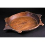 An Indian carved wood tortoise shaped dough bowl, with shallow sides, 49cm x 35cm at widest