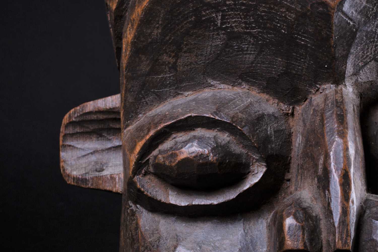 A Bamileke helmet mask, Cameroon, an elliptical opening to the crown of the elongated head, with - Image 6 of 7