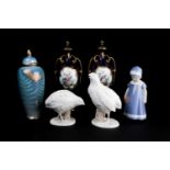 A pair of 20th Century Royal Crown Derby covered vases and covers, with hand-painted reserves of