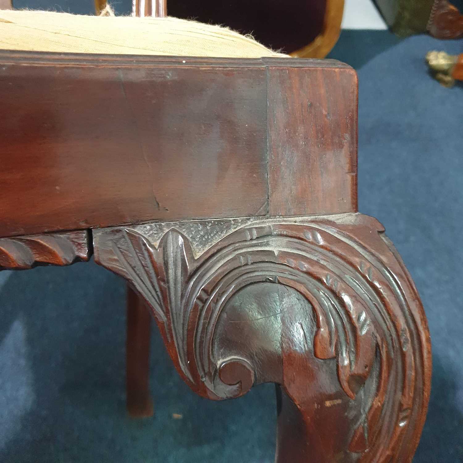 A pair of George III carved and pieced mahogany "Chippendale" style side chairs with bow-shaped - Image 10 of 24