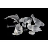 A group of five assorted modern Lalique frosted glass models of animals, comprising a dolphin,