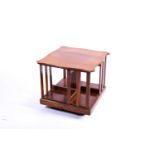 An Edwardian, walnut cartouch topped, revolving tabletop bookcase. 38cm wideCondition report: Good